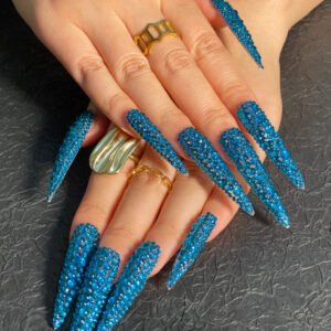 Sparkling Blue Gem Stiletto Nails