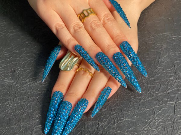 Sparkling Blue Gem Stiletto Nails